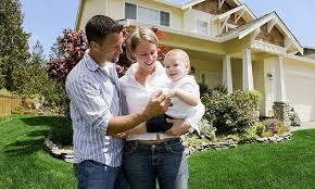 People in front of a house